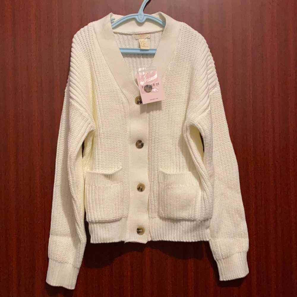 A brand new sweater cardigan